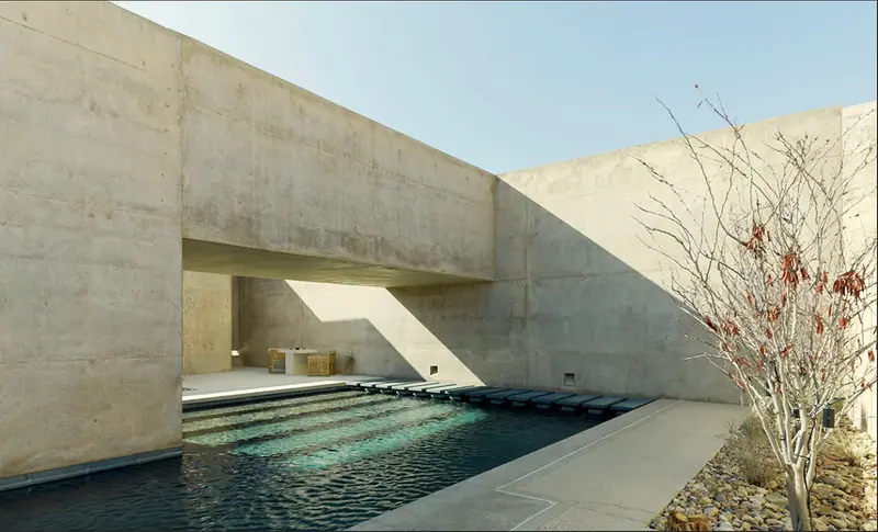 The pool at Amangiri wrapped around a sandstone outcrop