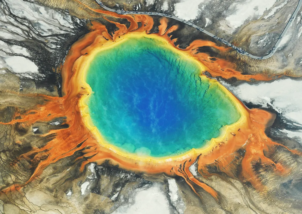 Aerial view of the rainbow-ringed Grand Prismatic Spring in Yellowstone