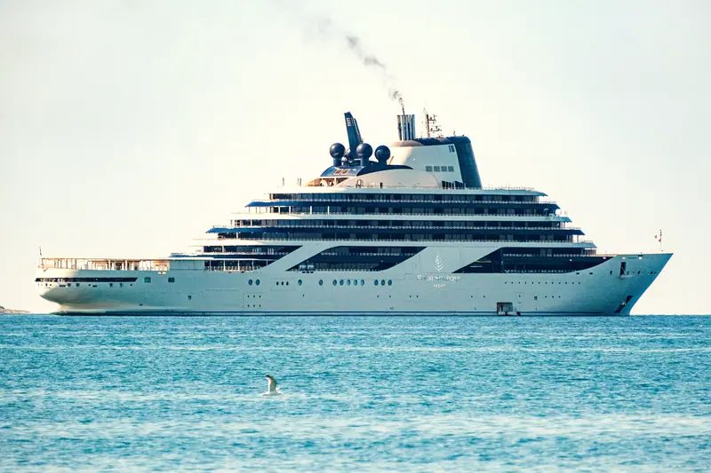 The white Four Seasons I yacht at anchor on calm blue water off Poreč, Croatia