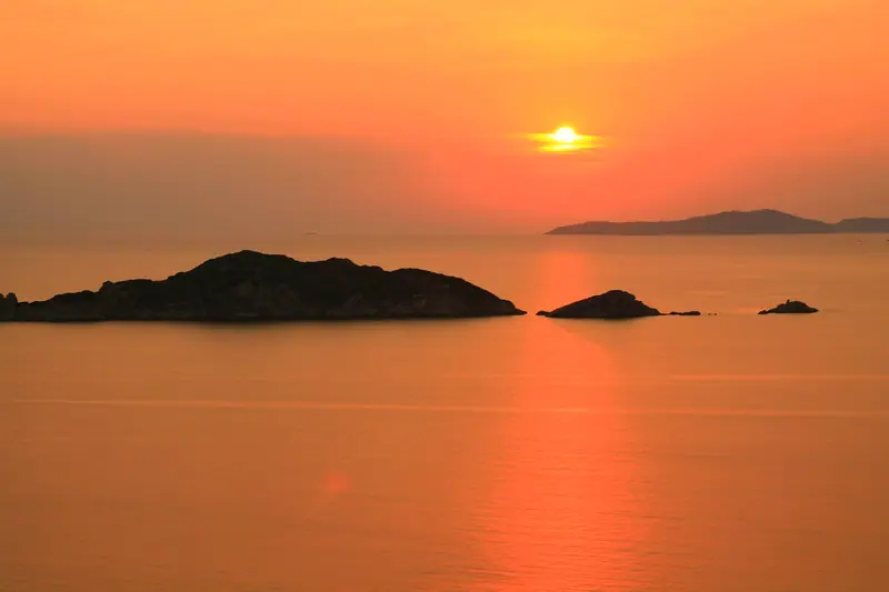 Golden sunset over small islets in the Ionian Sea, Greece