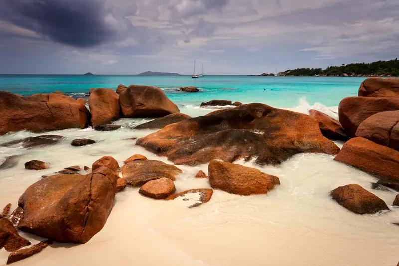 Granite boulders and turquoise water at Anse Lazio on Praslin