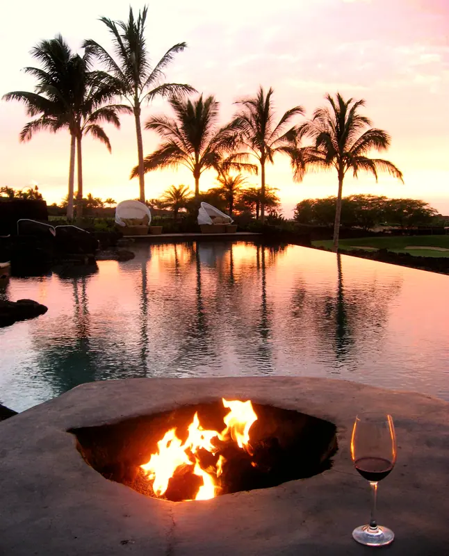 Four Seasons Hualalai pool at sunset